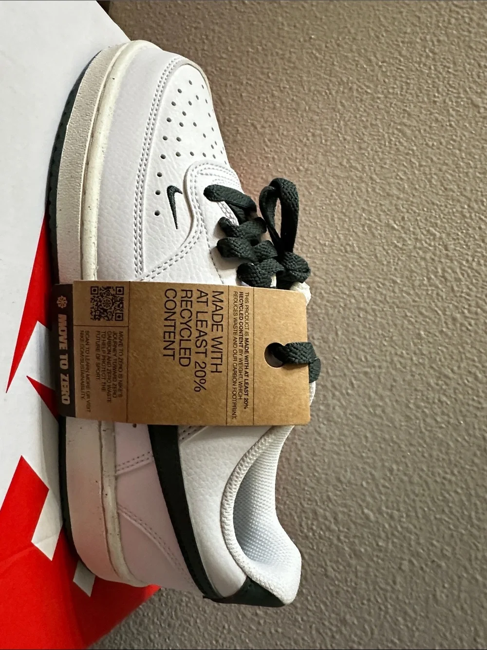 Nike White Low-Top Sneakers with Dark Green Swoosh and Heel